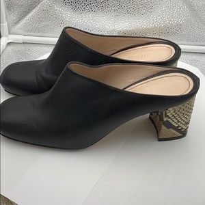 Barney’s Black leather Mules with snake skin heels